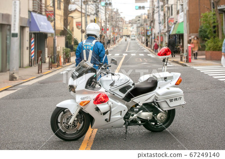 Traffic regulation for road blockade by motorcycle 67249140