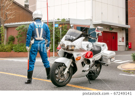 Traffic regulation for road blockade by motorcycle 67249141