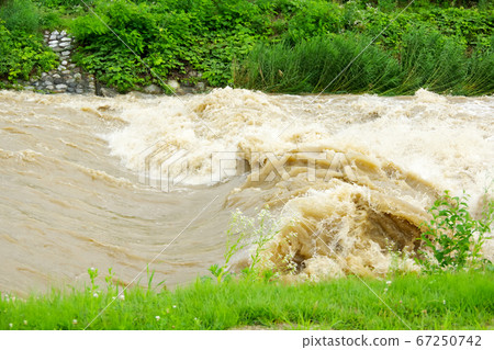 Tenryu river after heavy rain in Iida city 67250742