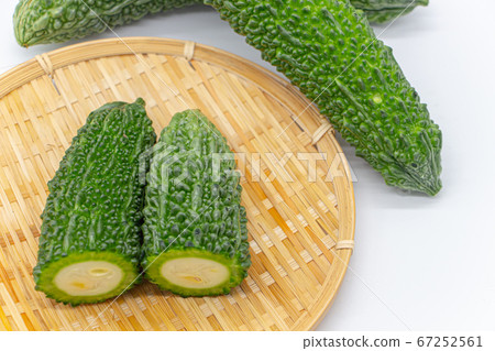 Slice of bitter gourd Slice of bitter gourd on a colander Slice of bitter gourd Slice of bitter gourd on a colander 67252561