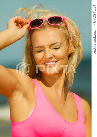 Young girl on beach. Young girl on beach. 67254114