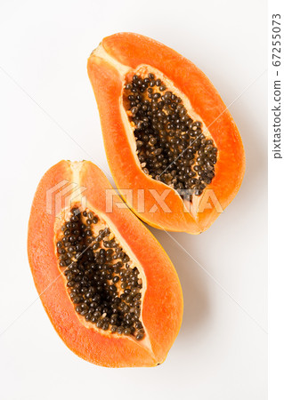Fresh papaya fruit on the white background Fresh papaya fruit on the white background 67255073