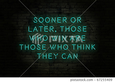 Wise quote. Neon inscription against brick wall 67255409
