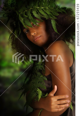Sensual portrait of a pretty young black woman 67255439