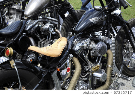 KUALA LUMPUR, MALAYSIA -SEPTEMBER 25, 2016: Custom motorcycle. Customized from old motorcycle model by the designer to fulfill their passion and creativity.  KUALA LUMPUR, MALAYSIA -SEPTEMBER 25, 2016: Custom motorcycle. Customized from old motorcycle model by the designer to fulfill their passion and creativity.  67255717