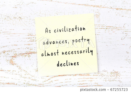 Wise quote on sticky note on wooden wall Wise quote on sticky note on wooden wall 67255723