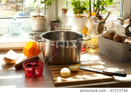 Kitchen working surface at the window. Cooking process Kitchen working surface at the window. Cooking process 67255766