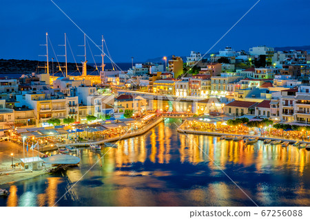 Beautiful Agios Nikolaos town at night. Lasithi region of Crete island, Greece Beautiful Agios Nikolaos town at night. Lasithi region of Crete island, Greece 67256088