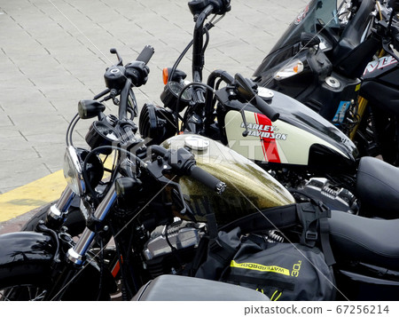 KUALA LUMPUR, MALAYSIA -JULY 29, 2017: Design of Harley-Davidson motorcycle brand and logos printed on the motorcycle body. Some of the logos were costume made by the owner.   67256214