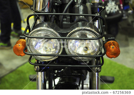 KUALA LUMPUR, MALAYSIA -MARCH 31, 2018: Motorcycle headlamps. Designed specifically to give enough vision for the rider during daytime and night.     67256369