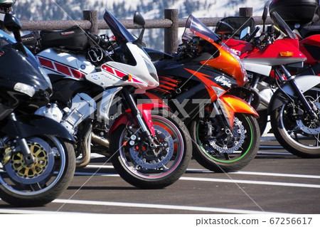 Motorcycle touring image lined up in the parking lot 67256617