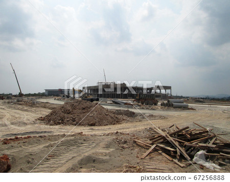 KUALA LUMPUR, MALAYSIA -AUGUST 25, 2017: Construction site in progress during daytime. Construction of the structure of the building is on-going. KUALA LUMPUR, MALAYSIA -AUGUST 25, 2017: Construction site in progress during daytime. Construction of the structure of the building is on-going. 67256888