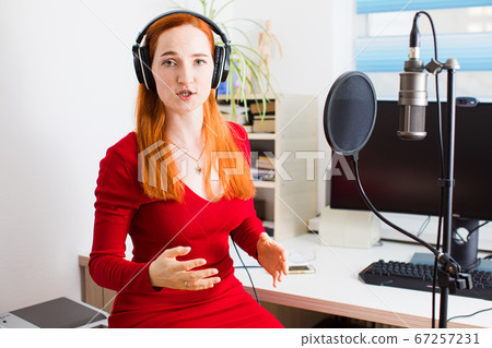 The announcer on the radio trains diction before the start of the broadcast The announcer on the radio trains diction before the start of the broadcast 67257231