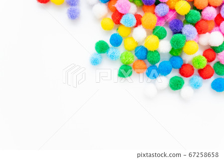 Colorful felt balls white background 67258658