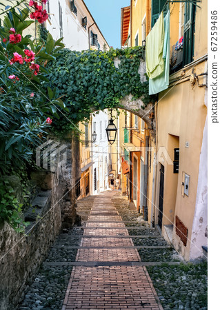 Narrow street in Sanremo, Italy 67259486