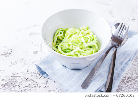 Healthy Zucchini Noddles with pesto Healthy Zucchini Noddles with pesto 67260102