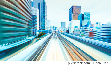 POV train motion blurred concept from the Yuikamome monorail in Tokyo, Japan 67261044