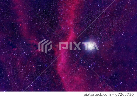 Red galaxy with stars and nebulae in deep space. 67263730