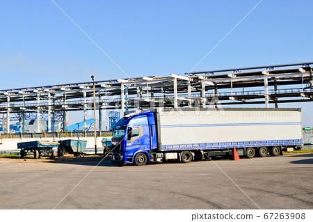 Large blue truck with cab and trailer Large blue truck with cab and trailer 67263908