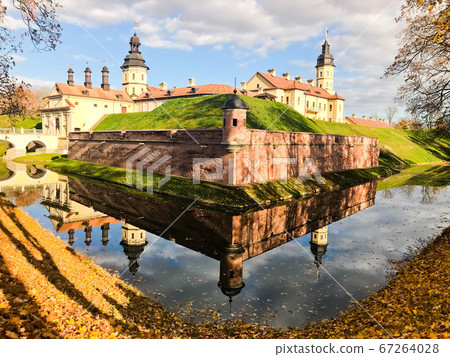 Old, ancient medieval castle with spiers Old, ancient medieval castle with spiers 67264028