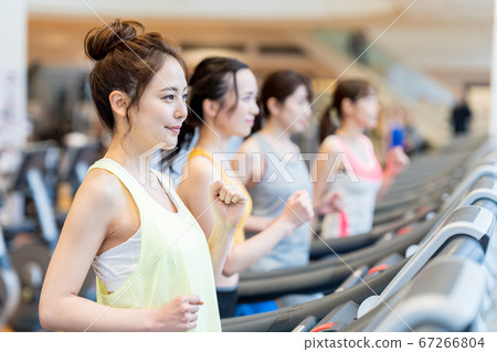 Young woman, gym, running machine Young woman, gym, running machine 67266804