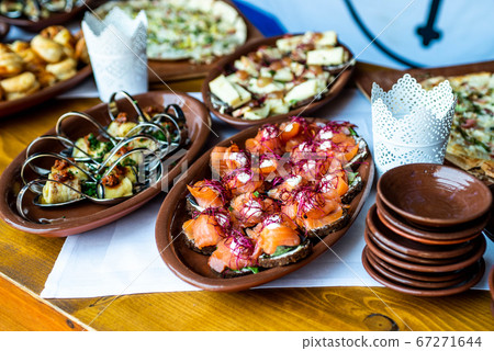 Party Brunch Fingerfood big Buffet table setting with Food Meat Vegetables 67271644