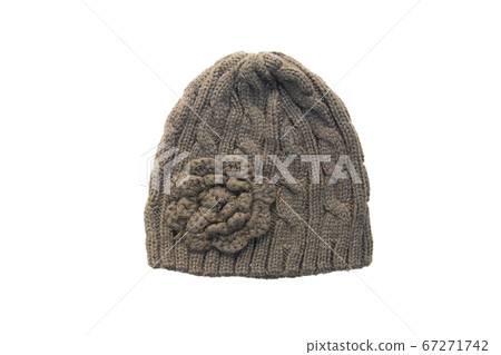 Warm Winter Brown knitted wool hat isolated on Warm Winter Brown knitted wool hat isolated on 67271742