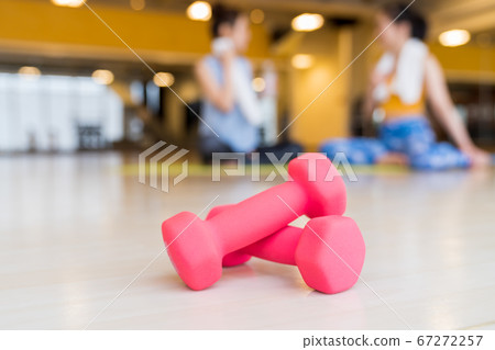 Young woman exercising Young woman exercising 67272257