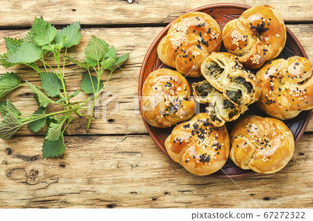 Homemade buns with nettles. Homemade buns with nettles. 67272322