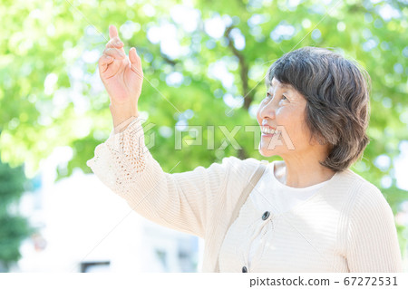 Senior woman on a walk Senior woman on a walk 67272531