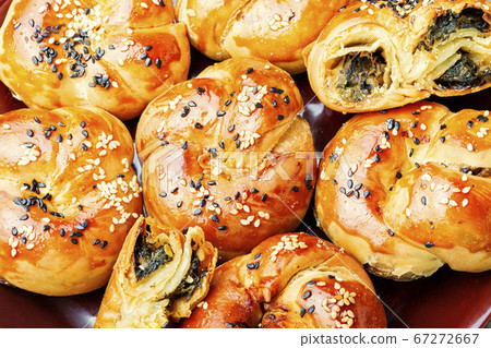 Appetizing bun with nettles. 67272667