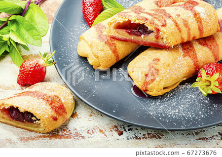 Homemade pies with strawberries. 67273676