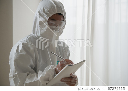 Men in protective clothing 67274335