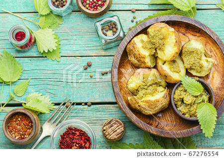 Home baked potato with greens. Home baked potato with greens. 67276554
