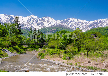 (Nagano Prefecture) Himekawa, a suspension bridge of Oide and the Northern Alps (Nagano Prefecture) Himekawa, a suspension bridge of Oide and the Northern Alps 67277069