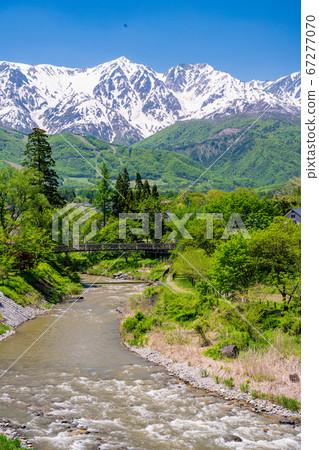 (Nagano Prefecture) Himekawa, a suspension bridge of Oide and the Northern Alps (Nagano Prefecture) Himekawa, a suspension bridge of Oide and the Northern Alps 67277070