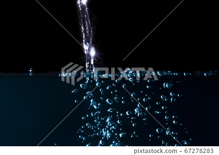 Blue water waves with beautiful bubbles Blue water waves with beautiful bubbles 67278283