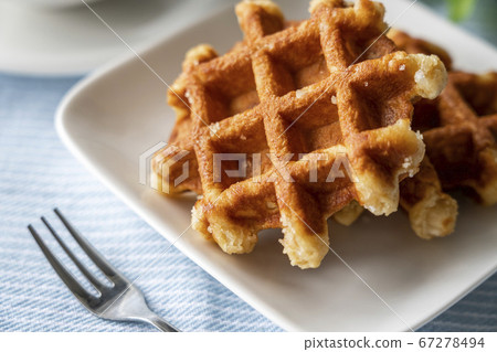 Waffles prepared for tea time Waffles prepared for tea time 67278494