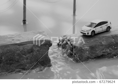 Breakdown of the levee due to heavy rain and diorama of people calling for help 67279624