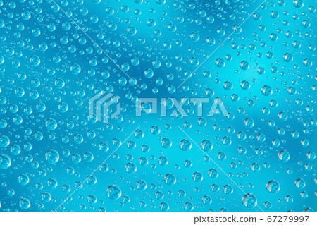 Water drops on blue background. Top view. Closeup. Water drops on blue background. Top view. Closeup. 67279997