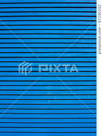 Blue wall of thin boards background or texture 67280282