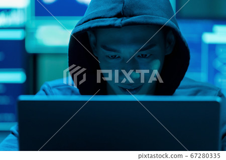 Asian male hacker use laptop Asian male hacker use laptop 67280335