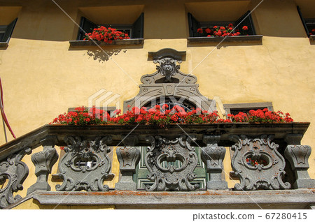 Ancient house with stone balcony - Zuoz village Engadine Switzerland 67280415