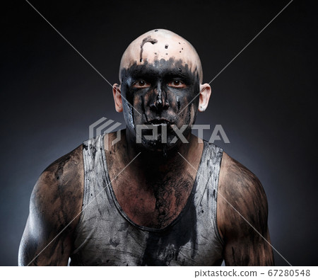 Bald mad man with black goo in the mouth Bald mad man with black goo in the mouth 67280548