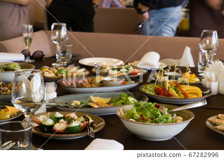 Served for a banquet table. A lot of food Served for a banquet table. A lot of food 67282996