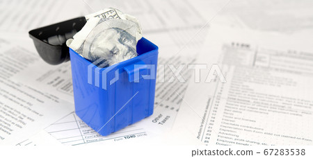 Many american tax blank forms and crumpled hundred Many american tax blank forms and crumpled hundred 67283538