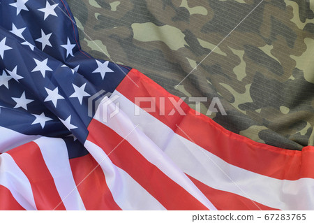 United States of America flag and folded military 67283765