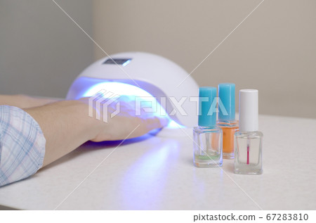 Three colorless transparent nail polish bottles in Three colorless transparent nail polish bottles in 67283810