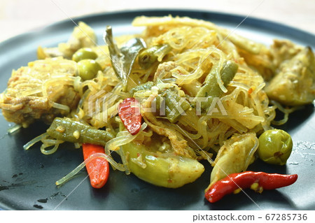 spicy fried glass noodles with pork and bamboo shoot with eggplant on plate 67285736