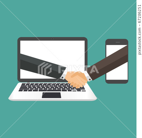 Businessmen shaking hands through a laptop screen 67286251